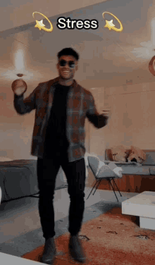 a man wearing sunglasses and a plaid shirt is dancing in a living room with the words stress above him