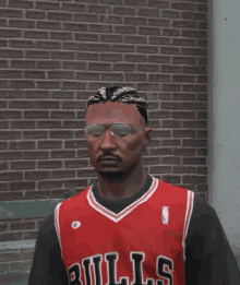 a man is wearing a bulls jersey and sunglasses .