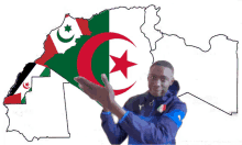 a man stands in front of a map of algeria with flags on it