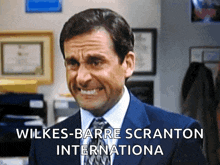 a man in a suit and tie with the words wilkes-barre scranton international written below him