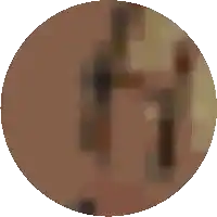 a blurred image of a person 's face in a circle