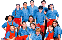 a group of children wearing blue shirts and red overalls are posing for a picture