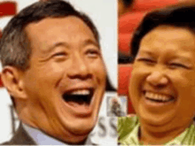 a man and a woman are laughing with their mouths open