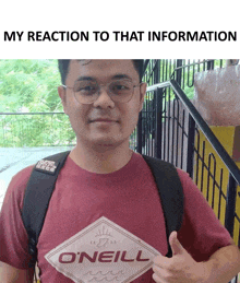 a man wearing a red shirt that says o'neill on it