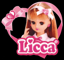 a doll with a pink bow and the word licca