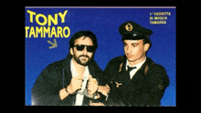 a man in handcuffs is standing next to a police officer with the name tony tammaro on the top