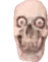 a blurry picture of a skull with big eyes and a smile .