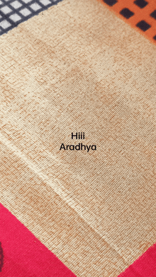 a close up of a rug with the name hiii aradhya