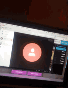 a computer screen shows a red circle with a person 's face in it