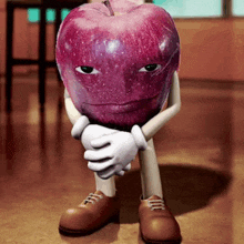 a cartoon apple with arms and legs is sitting on the floor with his hands on his knees .