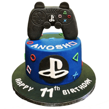 a cake that says happy 11th birthday with a controller on top