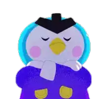 a penguin is wearing a scarf around its neck and sleeping