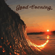 a wave in the ocean at sunset with the words `` good evening '' written below it .