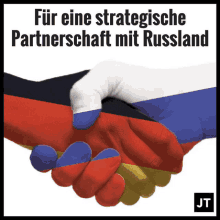 two hands shaking with flags painted on them and the words " für eine strategische partnerschaft mit russland " below them