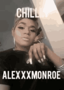 a woman is taking a selfie with a caption that says chill alexxmonroe .