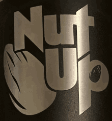 a black background with the words nut up on it