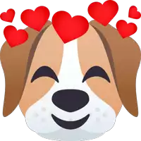 a brown and white dog with red hearts on his head