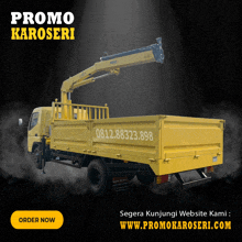 a yellow truck with a crane on the back is advertised for promo karoseri