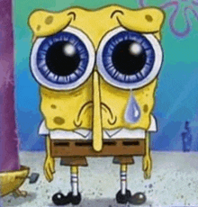 spongebob squarepants is crying with a tear coming out of his eyes .