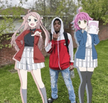 a man is standing in the grass with two anime girls .