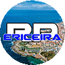 a circle with a picture of a city and the words rp ericeira on it .