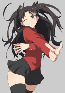 a girl in a red sweater and black skirt is giving a thumbs up