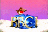 a bbc logo is shown on a purple background