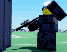 a lego man is holding a sniper rifle in his hand .