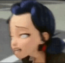 a close up of a cartoon character with blue hair making a funny face .