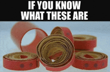 a bunch of red rolls of paper with the words if you know what these are