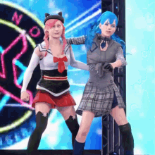 two girls are dancing in front of a sign that says no