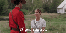 a man in a red uniform stands next to a woman with the words if you say so written below them