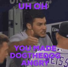 a baseball player giving a thumbs up with the words " you made dog the dog angry " behind him