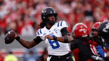 duke football player number 6 throws a pass