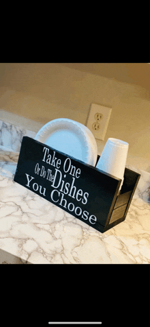 a sign that says take one or do the dishes you choose on it