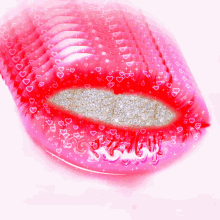 a close up of a woman 's lips surrounded by hearts and diamonds