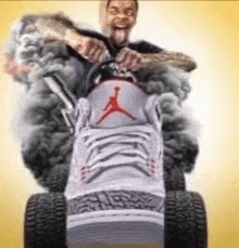 a man is riding on the back of a lawn mower .