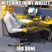 a man sits at a desk with his feet up and a meme that says " netcoins in my wallet job done "