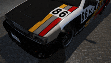 a black and white car with the number 86 on it