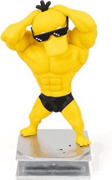 a statue of a muscular yellow duck wearing sunglasses and underwear