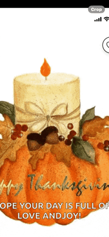 a thanksgiving card with a pumpkin and a candle on it