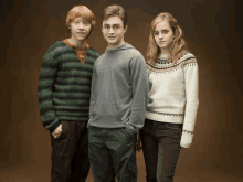 harry potter and his friends pose for a picture with their hands in their pockets