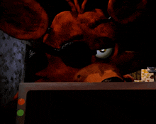 a close up of a cartoon character looking at a computer screen