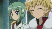 a boy with blonde hair and a girl with green hair are smiling