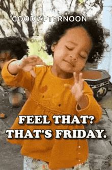 a little girl is making a peace sign with her hands and says good afternoon feel that ? that 's friday .