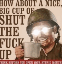 a soldier in a helmet is holding a cup of coffee and smiling .