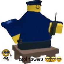 a lego man is sitting on a wooden table holding a walkie talkie and sunglasses .