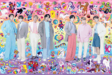 a group of boys are standing in front of a colorful background with stickers on it including one that says love live