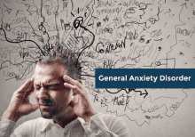 a man is holding his head in front of a wall that has scribbles on it and the words general anxiety disorder