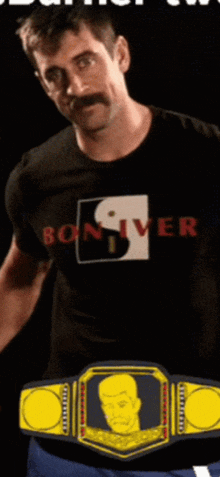 a man with a mustache wears a black shirt that says boniver